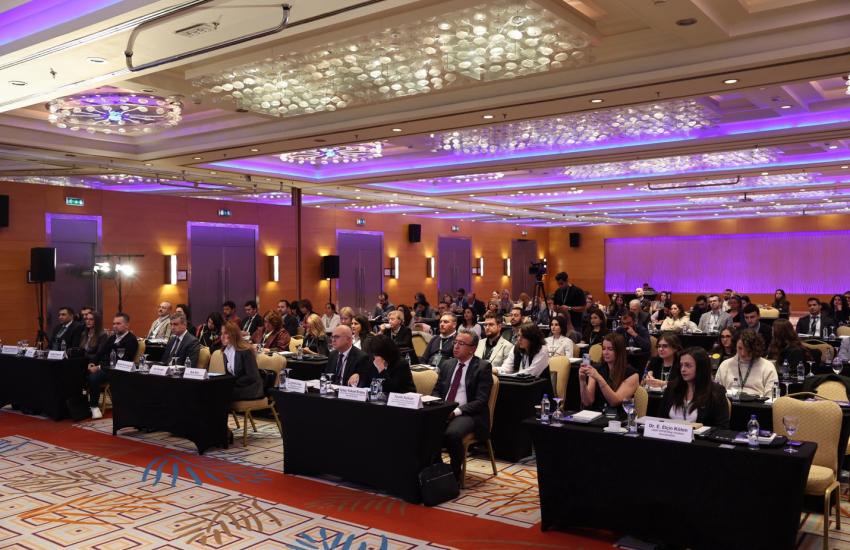 Participants listening to opening remarks